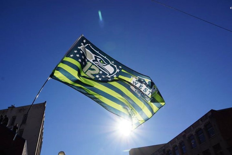 Seattle victory flag raised at the super bowl parade in downtown seattle 0.jpg?ixlib=rails 2.1