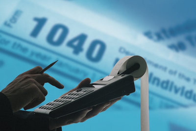 Rsz taxes adding machine.jpg?ixlib=rails 2.1