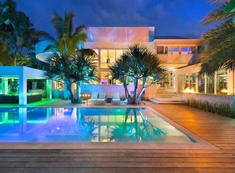Rsz high end luxurious modern mansion with colorful lighting at night located in miami homesthetics florida 1.jpg?ixlib=rails 2.1