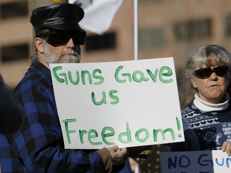 Guns gave freedom sign ap.jpg?ixlib=rails 2.1