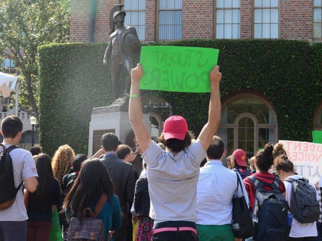 Usc trojan protest neon tommy flickr cc cropped 640x480.jpg?ixlib=rails 2.1