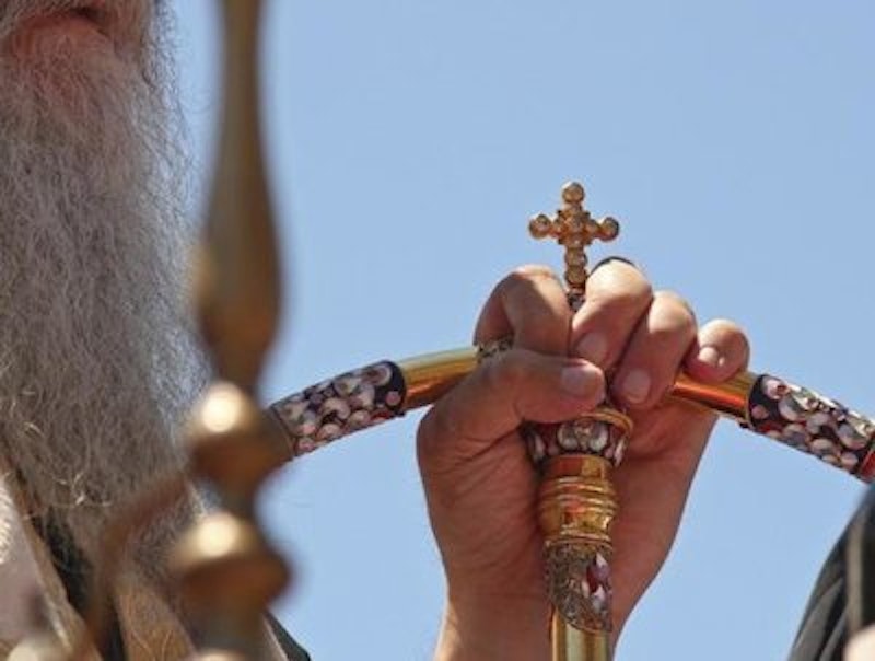 Rsz 449079 an orthodox priest holds a cross as serbs gather to mark the anniversa.jpg?ixlib=rails 2.1