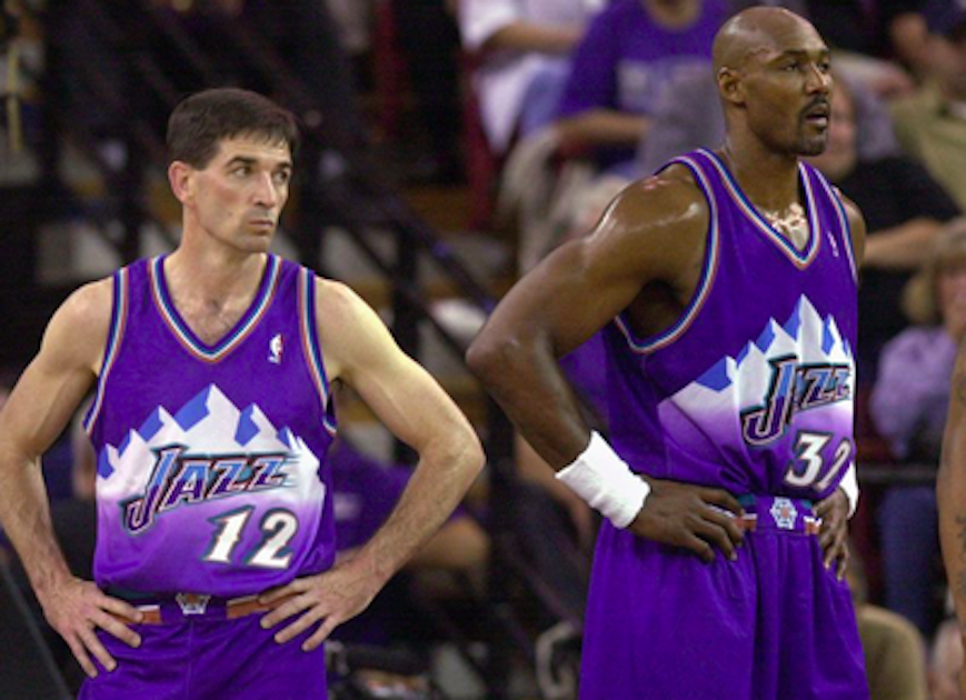 John Stockton of the Utah Jazz stands on the court during an NBA game