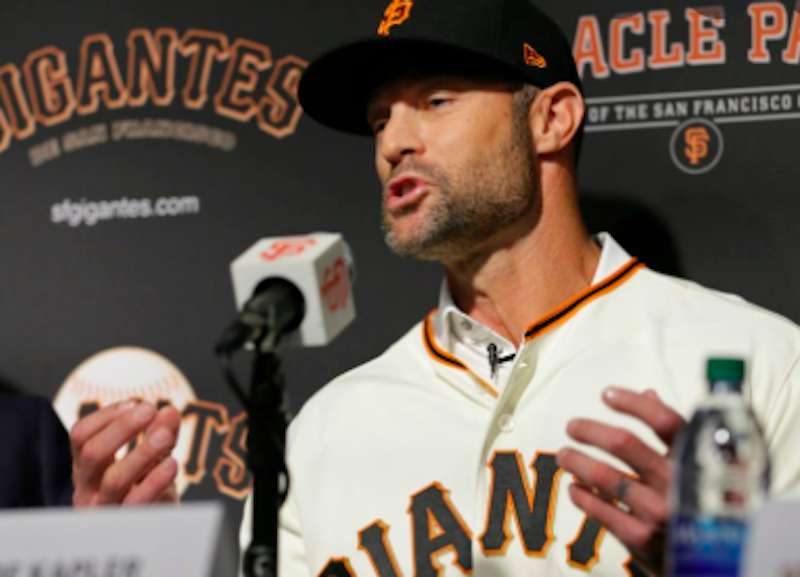 San Francisco Giants manager won't stand for anthem following mass