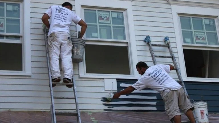 Two painters applying first coat of paint to siding edited 768x432.jpg?ixlib=rails 2.1