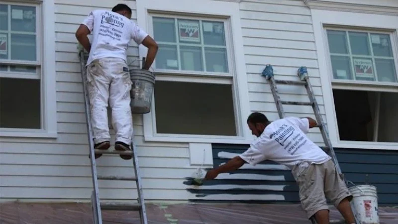 Two painters applying first coat of paint to siding edited 768x432.jpg?ixlib=rails 2.1